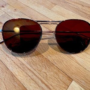 EUC Oliver People’s Round goldstone sunglasses.